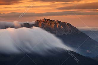 CLouds rolling over Udalaitz mountain Basque Country