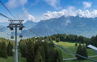 Cable railway and panorama view of mountain landscape in Switzerland