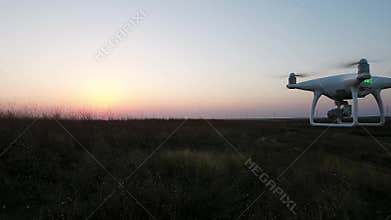 Drone filmed by another drone