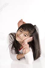 Girl chin on hand smiling
