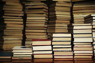Book stairs on the background of the books