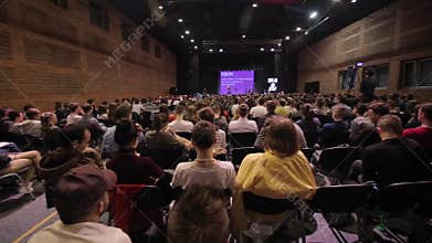 Brest, Belarus - MAY 9, 2018: A lot of young people studying at the conference. They sit in a large auditorium and