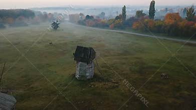 Ukrainian countryside village authentic rural mills atmosphere. Countryside glade with mills . Lovely calm mood nature