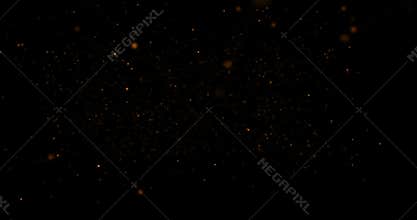 Christmas gold gradient sparkle glitter dust particles on black background with bokeh flowing movement, golden holiday happy new