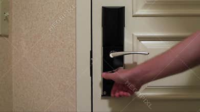 Hand closing and locking hotel door