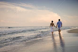 Couple Walking on Beach