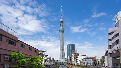 Time lapse video of Tokyo Sky Tree with cloudy sky in Tokyo, Japan timelapse