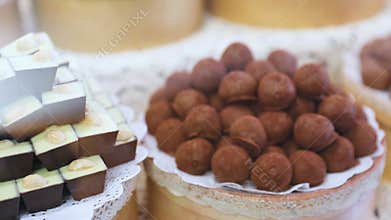 Chocolate store. Chocolate sweets on shelves in shop