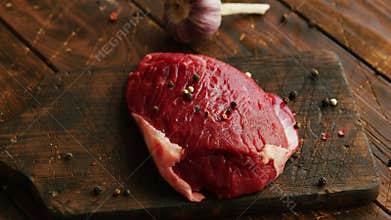 Pepper and garlic near meat
