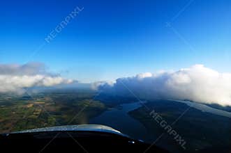 Flying With The Clouds