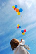 Child with balloons