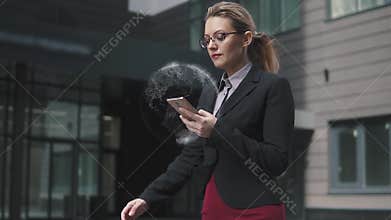 Business woman holding a mobile phone and uses holography and augmented reality. concept of new technologies, additional