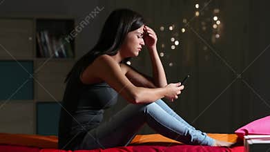 Sad cyber bullying victim complaining at home