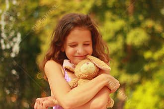 Sunny red-haired girl with ocher hair