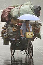 Poor people making living in a rainy situation