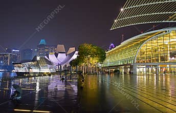 Marina Bay Sands Promenade Event Plaza with The Shoppes and Art Science Museum & Louis Vuitton Island Maison on a rainy day