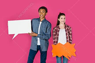teen couple with blank speech bubbles