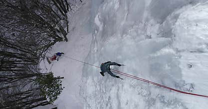 Ice Climbing Frozen Waterfall.