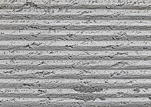 Gray striped stone background. Texture background of concrete