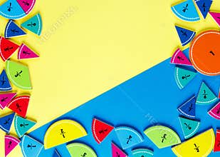 Colorful math fractions on the yellow and blue bright backgrounds. interesting math for kids. Education, back to school concept. G