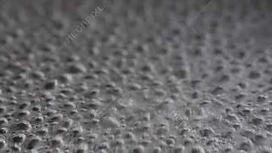 Abstract close-up on the surface of boiling water