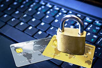 Padlock on Top of Credit Cards on Keyboard Cyber Security Concept