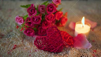 Valentine day with footage decoration heart, candle burning and bouquet