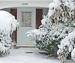 Front Door and Walkway In Big Snowstorm