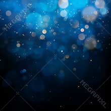 Blurred bokeh light on dark blue background. Christmas and New Year holidays template. Abstract glitter defocused