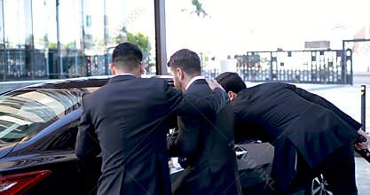 Protecting businessman from danger