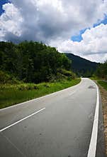 Ashpalt road with blue sky