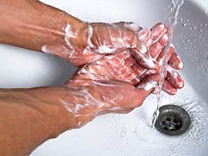 Washing soapy hands