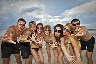 Team of friends at the beach