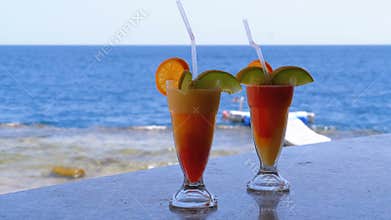 Exotic Fresh Cocktail on the Bar Counter on the Background of the Red Sea