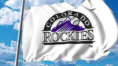 Waving flag with Colorado Rockies professional team logo. 4K editorial clip