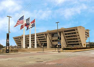 Dallas City Hall with American, Texas, and Dallas Flags in front