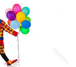 A Clown holding ballons