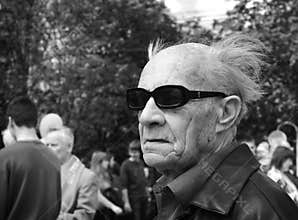 Man in sunglasses at May Day march