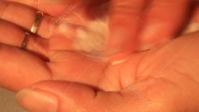 Girl cleanse face with cleansing cream