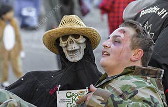 Death holding his victim at German fastnacht carnival