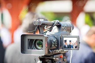 Camera show viewfinder image catch motion in interview or broadcast wedding ceremony