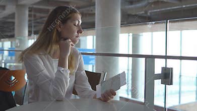 Young blonde girl was late for plane