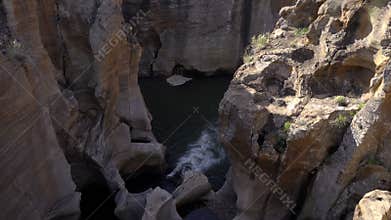 The canyon below Bourke`s Luck pot holes bridge