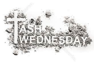 Ash Wednesday word written in ash, sand or dust