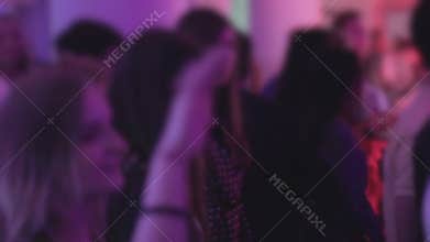 Many people partying, clubbing, enjoying nightclub atmosphere