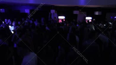 People clubbing, DJ at work using professional sound equipment
