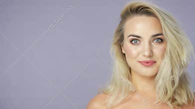 Blonde positive young woman