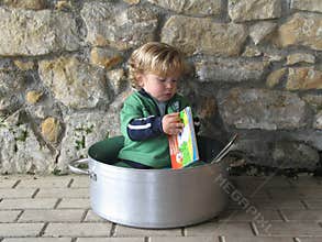 Portrait of a baby in a very different children`s library