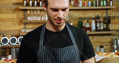 Waiter using digital tablet in cafe 4k