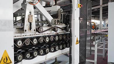 Industry, automatic hain sprockets in action on factory